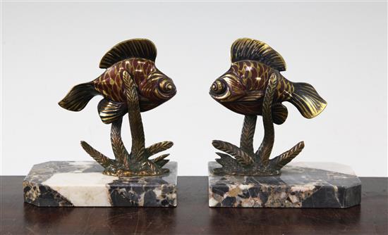 A pair of French Art Deco painted bronze bookends, modelled as fish amongst reeds, 5.5in.